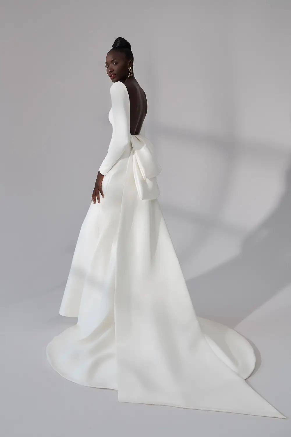 Model wearing a white gown 3